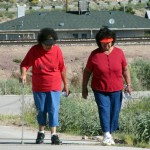 Elders in red, Leota Suminimo and Josie Powsey.